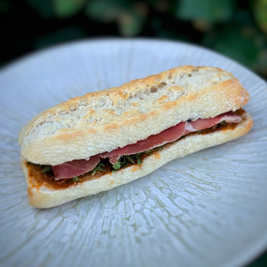 Mini sandwich à la coppa italienne affinée et roquette